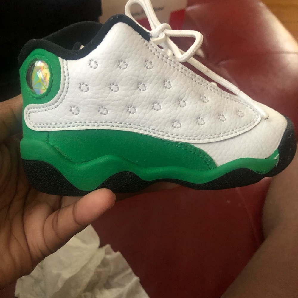 2 used pair of shoes in good condition Jordan and foam posits size 6 in toddler